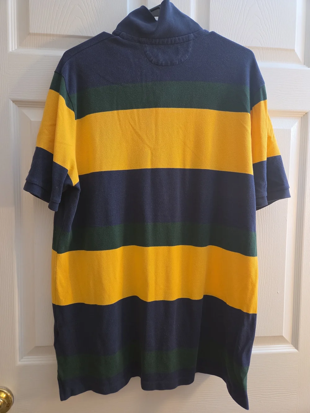 A Polo Ralph Lauren navy, yellow, and green striped short-sleeve.